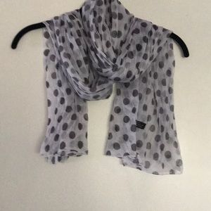 Adorable polka dot scarf.